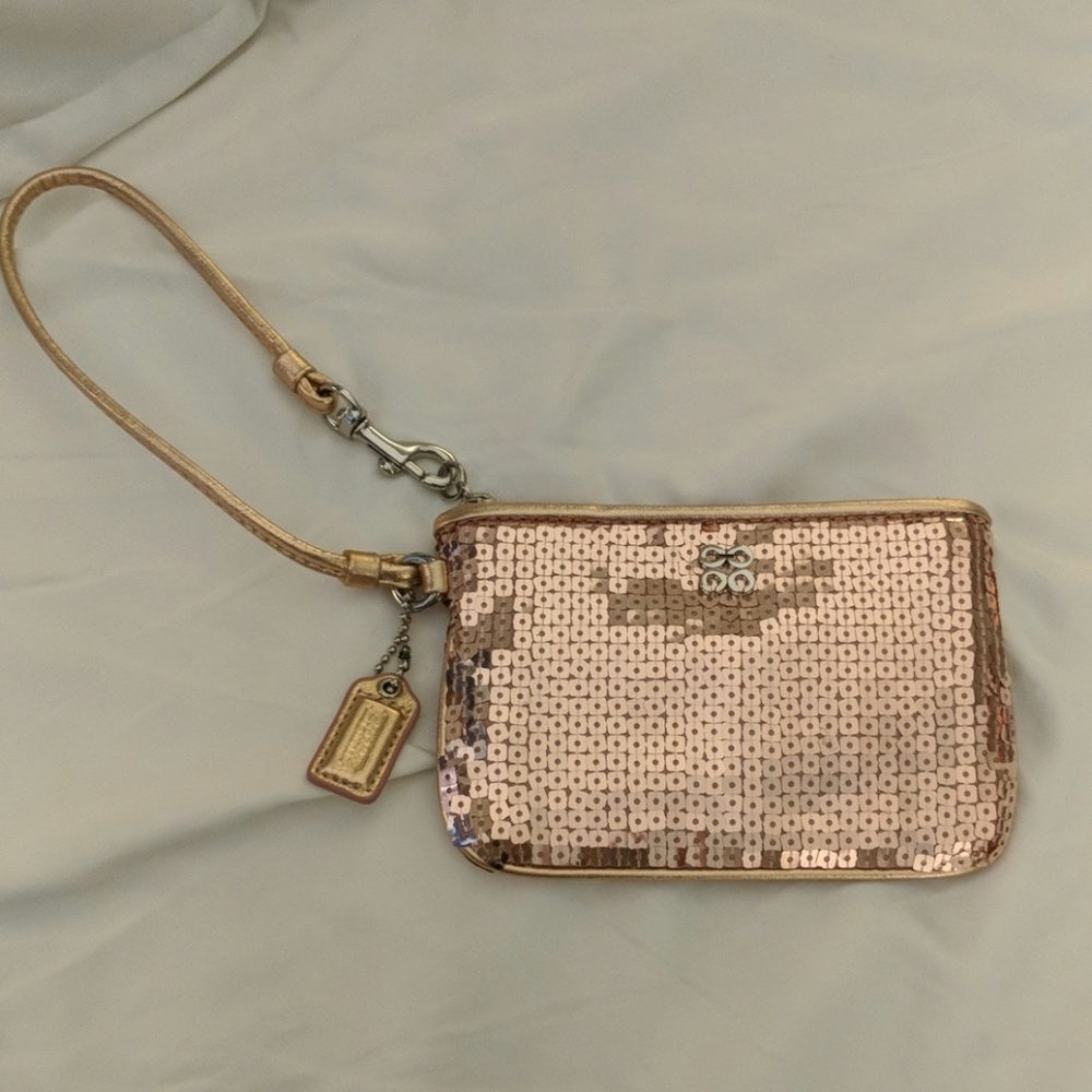 Coach Rose gold sequin wristlet EUC